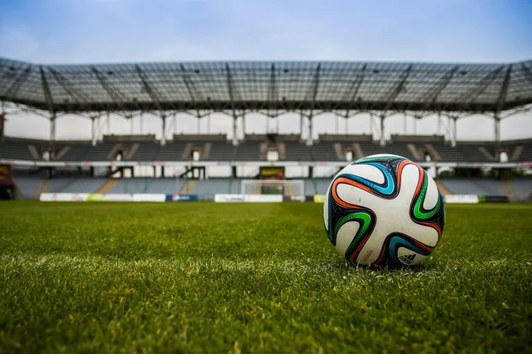 a football in the centre of a pitch