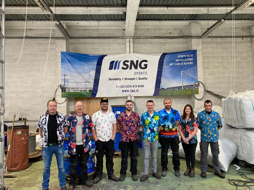 SNG Sports team wearing Hawaiian shirts